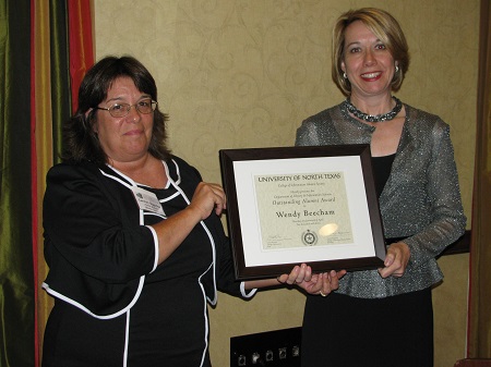 Alumni Society Chair Chair Carolyn Bogardus - Wendy Beecham with award