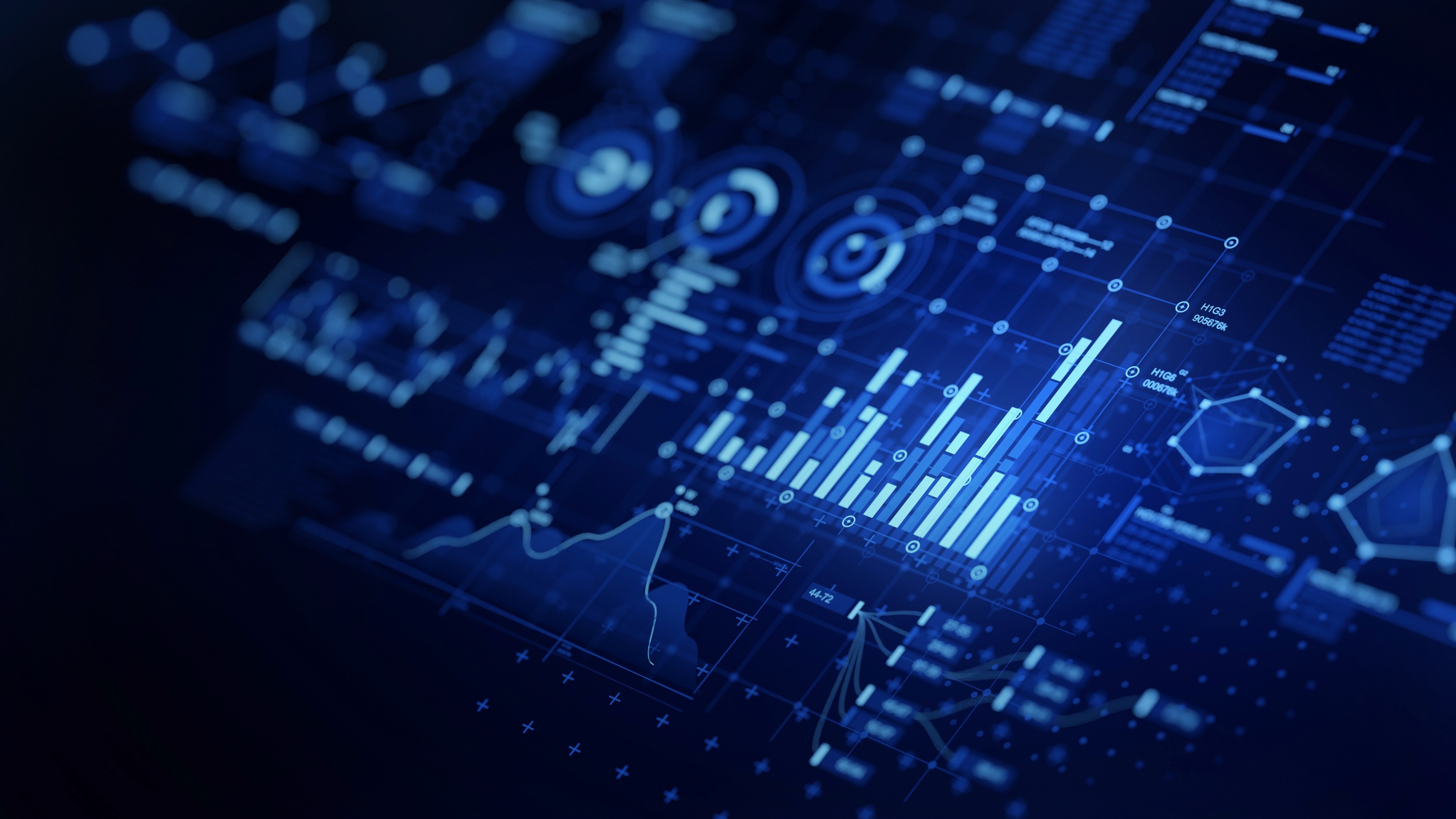 Blue tinted image of a dashboard with metrics and graphs.