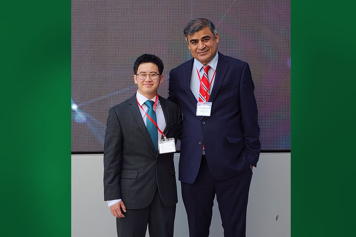 Andrew Summitt standing next to Dr. Sharad Sharma