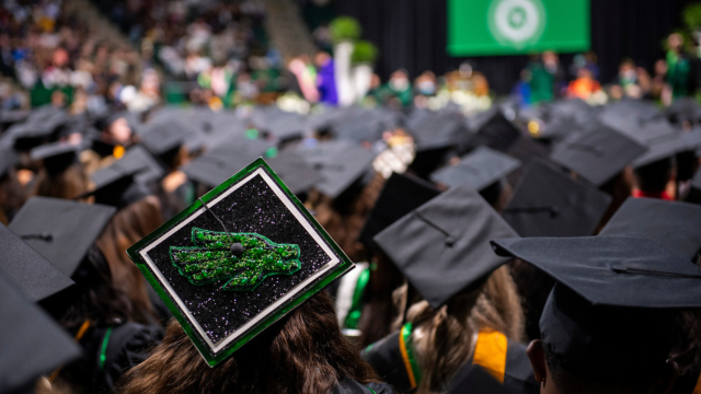 Grad caps up close at graduation.