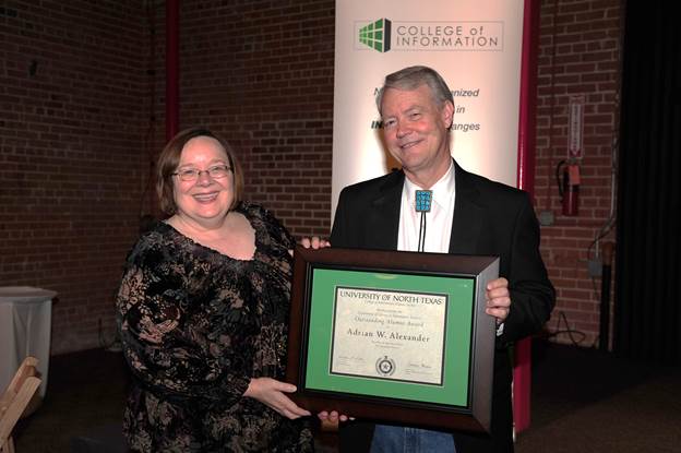  Chair Connie Moss - Adrian Alexander with award